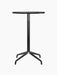 Front view of the Harbour Column Counter Table, featuring a round charcoal linoleum top and a black powder-coated star base.