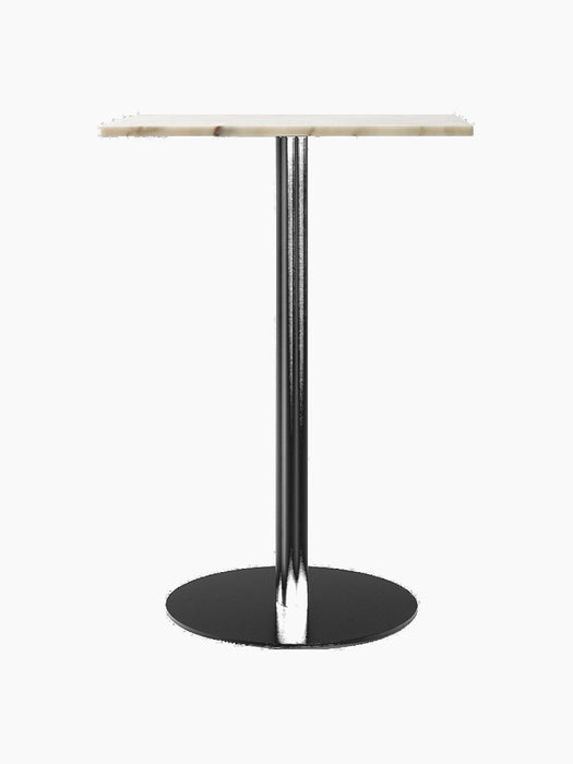 The Harbour Column Counter Table, featuring a rectangular off-white marble top and a slim black column with a round base.