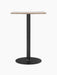 Front view of the Harbour Column Counter Table with a rectangular Kunis Brescia top and a black star-shaped column base.