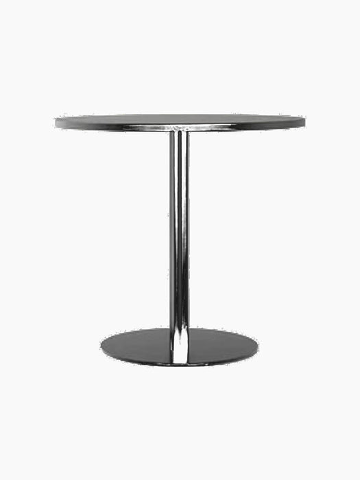 A front-on view of the Harbour Column Dining Table with a round charcoal linoleum top and a black column on a round base.