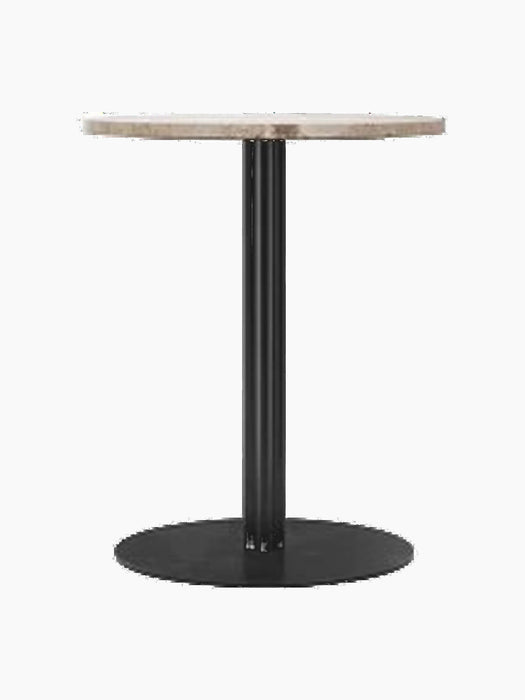 Front view of the Harbour Column Dining Table with a round Kunis Breccia stone top, a slim black metal column and base.