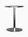 Front view of the black Harbour Column Dining Table with a round charcoal linoleum top and a slim column with a round base.