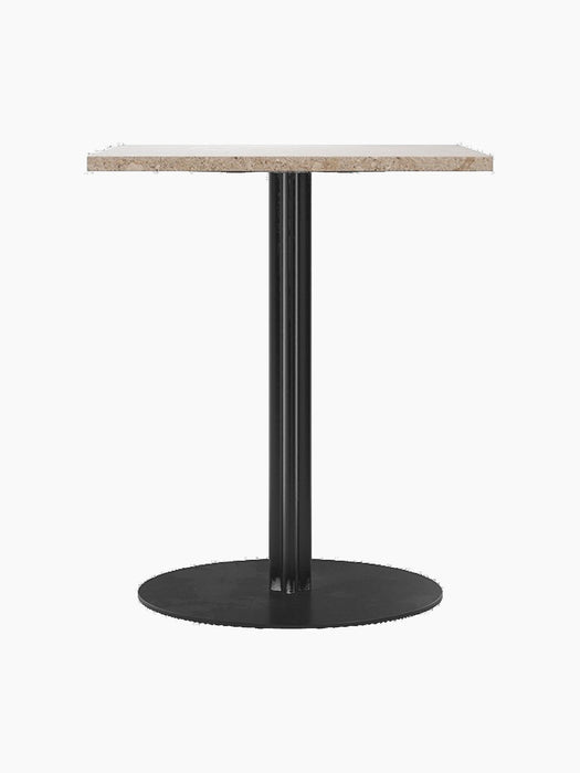 Front-on view of the Harbour Column Dining Table with a rectangular Kunis Breccia stone top and black column and round base.