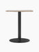 Front-on view of the Harbour Column Dining Table with a rectangular Kunis Breccia stone top and black column and round base.