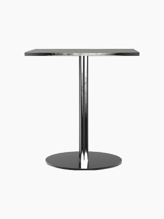 A Harbour Column Dining Table with a rectangular charcoal linoleum top, a slim black metal column, and a circular black base.