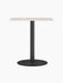 Front view of the Harbour Column Dining Table featuring a rectangular sand top on a black fluted column and round base.