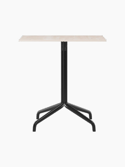Front view of the Harbour Column Dining Table with a rectangular Kunis Breccia stone top on a black star base.