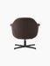 Back view of the Harbour Lounge Chair upholstered in dark brown fabric with a black four-legged star swivel base.