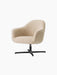Angled view of the Harbour Lounge Chair with a textured, light beige upholstered shell and a black, star-shaped swivel base.