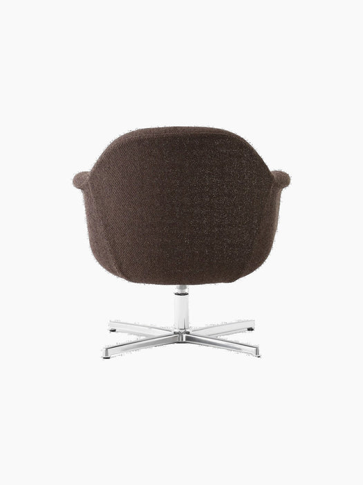 Back view of the Harbour Lounge Chair in brown textile with a polished aluminium star swivel base, on a black background.