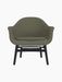 A front-on studio shot of the Harbour Lounge Chair, featuring olive-green Fiord 961 fabric and a black painted oak base.