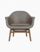 A front view of the Harbour Lounge Chair with a walnut frame and curved shell upholstered in taupe Dakar 0311 fabric.