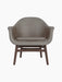 Front view of the Harbour Lounge Chair, featuring light brown Dakar 0311 upholstery and a sculptural dark stained oak frame.