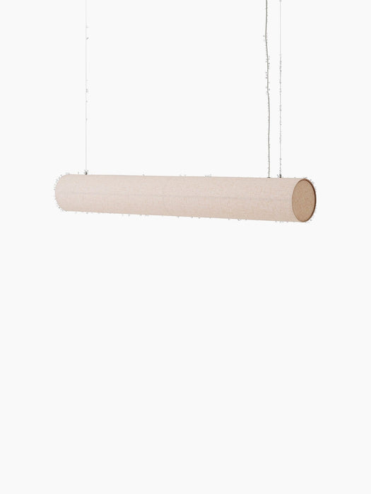 A studio shot of the Hashira Linear Pendant Lamp in Raw, switched off. It is a long, horizontal lamp with a raw linen shade.