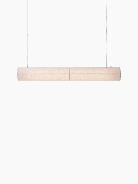 Front view of the Hashira Linear Pendant Lamp, Raw. Lit, horizontal lamp with a linen shade on a black background.