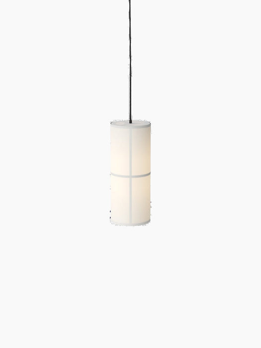 Front view of the small Hashira Pendant Lamp. The illuminated white linen shade reveals its internal graphic structure.