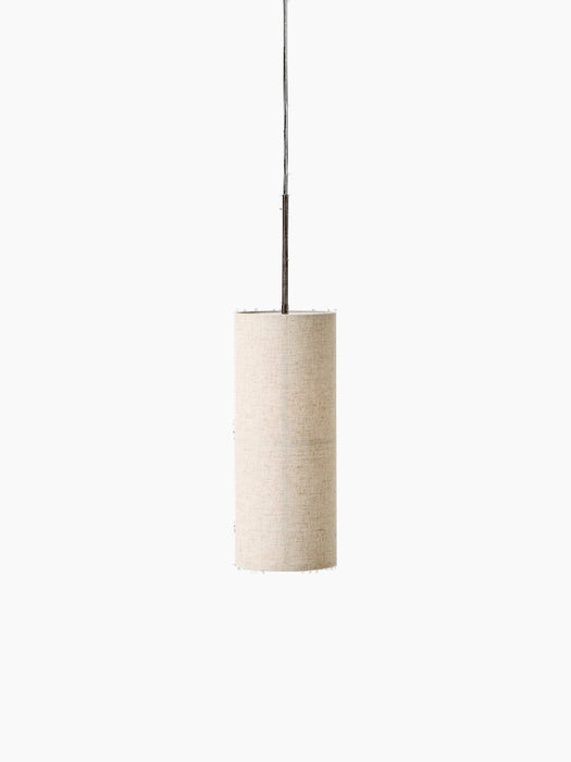 Front view of the Hashira Pendant Lamp, featuring a cylindrical, raw-coloured linen shade suspended from a thin black cord.