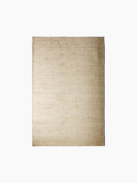 A top-down view of the rectangular Houkime Rug in beige. The rug features a ribbed texture with fine horizontal lines.
