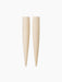 Two cone-shaped, cream-coloured Hydrous Watering Sticks with a vertically fluted texture against a black background.