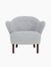 Front view of the Ingeborg Lounge Chair in a light grey fabric with four tufted buttons and dark stained oak legs.