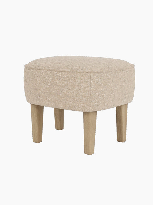 The Ingeborg Ottoman by Flemming Lassen, upholstered in a textured light beige fabric with four solid natural oak legs.