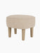 The Ingeborg Ottoman by Flemming Lassen, upholstered in a textured light beige fabric with four solid natural oak legs.