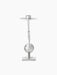 Front view of a tall, sculptural candlestick holder in polished chrome with a sphere on the stem and a rectangular base.