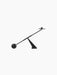 Side view of a modern minimalist black candle holder with a balancing arm, spherical counterweight, and single candle socket.