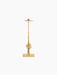 A front-on view of the sculptural Interconnect Candle Holder in polished brass, featuring a rectangular base and tall stem.
