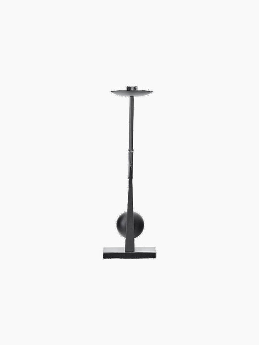 Rear view of the sculptural black Interconnect Candle Holder. It has a flat base, a stem through a sphere, and a top disc.