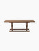 A front-on studio shot of the Jäger Lounge Table in walnut, displayed against a black background, highlighting its design.