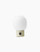 The JWDA Table Lamp, Portable, in Alabaster White, with a cylindrical base, black dimmer knob, and an elliptical glass shade.