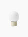 JWDA Portable Table Lamp in Alabaster White, seen from the back, with a cylindrical base and a frosted elliptical shade.