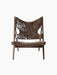 A front view of the Knitting Lounge Chair with a dark stained oak frame and plush, dark brown sheepskin upholstery.
