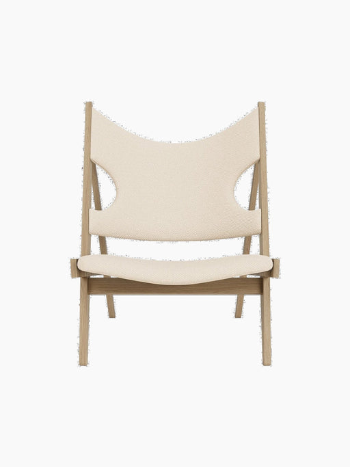 Front view of the Knitting Lounge Chair in natural oak with off-white textile upholstery on a black background.