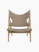 Front view of the Knitting Lounge Chair in Natural Oak. The chair has Logan Flint upholstery with distinctive elbow cut-outs.