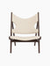 Front view of the Knitting Lounge Chair, with a dark stained oak frame upholstered in a light jasmine textile.