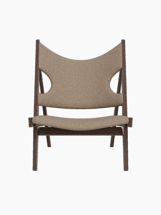 Front view of the Knitting Lounge Chair in dark stained oak with Logan Flint upholstery, on a black background.