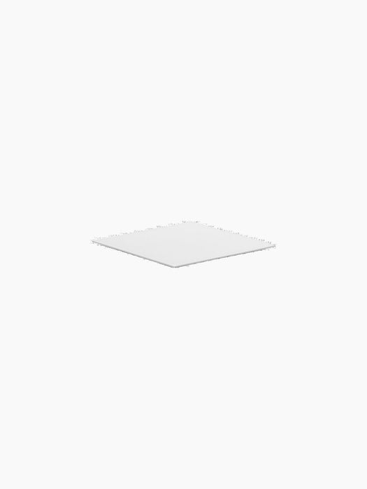 A close-up of the white Base For Line, a thin square plate, shown against a black background.