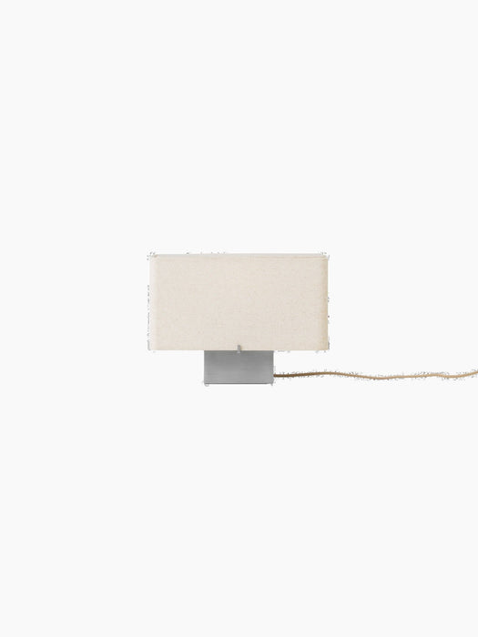 Front view of the Nonna Table Lamp, featuring a rectangular sand-coloured textile shade and a brushed aluminium base.