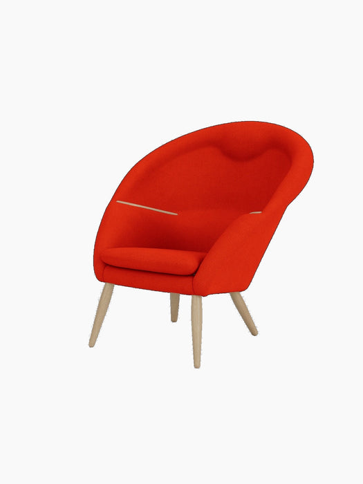A three-quarter view of the Oda Lounge Chair, upholstered in red Hallingdal 600 fabric with natural oak legs and armrests.