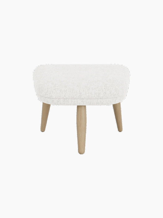 An Oda Ottoman with a light grey textured fabric seat and four tapered legs in natural oak, viewed from the front.