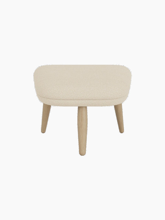 Front view of the Oda Ottoman, upholstered in a light cream Hallingdal 200 fabric, with four angled legs in natural oak.