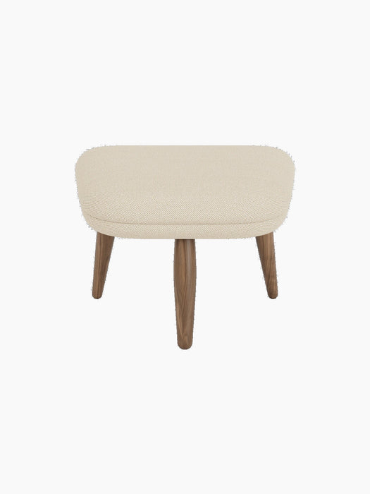 Front view of the Oda Ottoman, with a rectangular cushioned seat in light Hallingdal fabric and four tapered walnut legs.