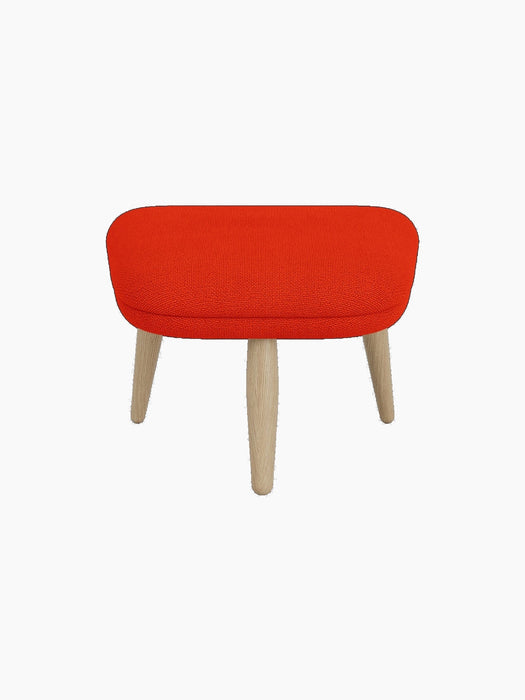 Front view of the Oda Ottoman upholstered in bright red Hallingdal 600 fabric with four natural oak legs.
