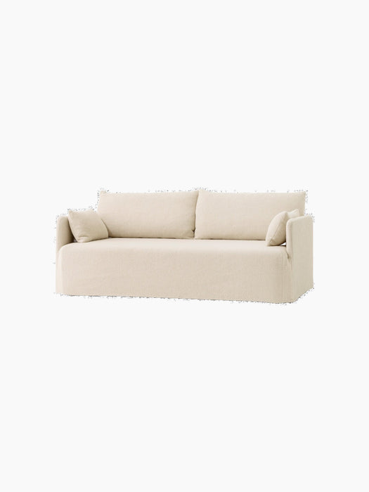 An angled studio shot of the Offset Sofa with Loose Cover. This 2-seater is upholstered in light, textured Jasmin fabric.
