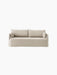 The 2-seater Offset Sofa with Loose Cover in a sand-coloured textured fabric, against a black background.