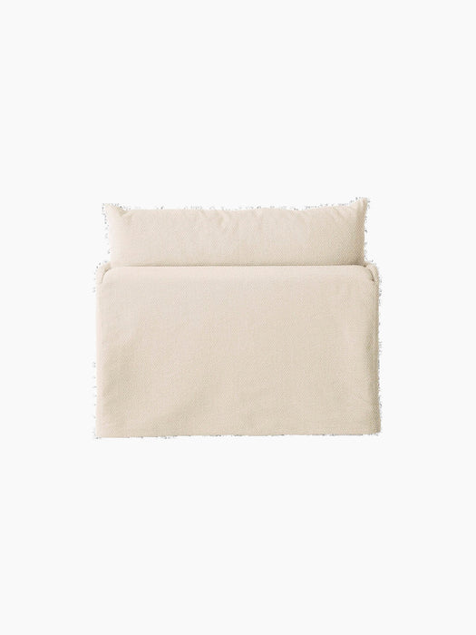 Back view of the Offset Sofa with a loose cover. The 1-seater armchair is upholstered in a textured, light cream fabric.