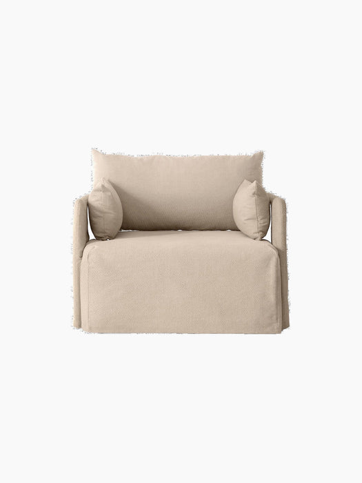 Frontal view of the Offset 1-Seater Sofa with a sand-coloured loose cover, large back cushion and two smaller side cushions.