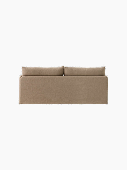 A back view of the Offset Sofa with Loose Cover, a two-seater model upholstered in textured, light brown Flint fabric.